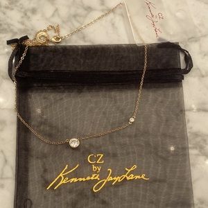 CZ By KENNETH JAY LANE: Round Bezel
Gold Necklace